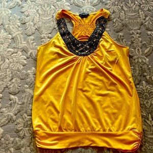 Yellow sleeveless blouse